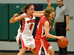 Maple Ridge Ramblers' Devan Cousins (left) keeps Claremont's Haley Cabral under wraps Friday in action from the 8th annual A Tournament For Emily at PoCo's Riverside Secondary. (Submitted photo)