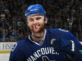 Zack Kassian of the Vancouver Canucks celebrates after scoring the game-winning shootout goal against the Calgary Flames last week at Rogers Arena.