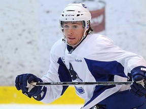 David Booth will undergo an MRI for a groin injury at Vancouver Canucks training camp.