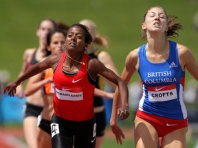 SFU's 800-metre specialist Helen Crofts (right), pictured in 2011 as she edged Lemlem Ogbasilassie to win her specialty distance at the Canadian track and field championships in Calgary, is setting the pace in NCAA Div. 2 this season as her times this weekend at the UW's Dempsey Indoors proved. (Calgary Herald photo)