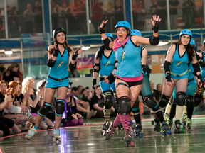 Risquée Biznatch gets her introduction and puts on a little show for the crowd at a bout on May 15, 2010. (TODD HOLBROOK PHOTO)