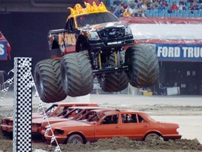 prv0204Bmonstertruck02  - Province Trucks and Cars story by Ian Harwood - Feb. 4, 2006  -  Vancouver, B.C. - Del Scorcho clears a hurdle  during the Monster Truck Monster Jam show at BC Place Saturday night in Vancouver.        Arlen Redekop photo / The Province