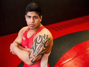 Burnaby Central's Amar Dhesi has been wrestling like a man among boys and is headed to Oregon State on scholarship next season. (Ric Ernst, PNG)