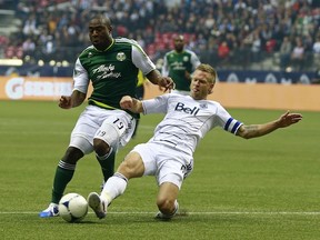 Whitecaps captain Jay DeMerit formed a strong partnership with Andy O'Brien down the stretch last season, but could he miss this year's season opener? (Getty Images)