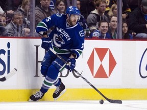 Forward Andrew Ebbett has been put on waivers by the Canucks.  (Photo by Rich Lam/Getty Images)
