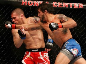 Matt Grice lost his fight to Dennis Bermudez, but saved his place on the UFC roster Saturday night at UFC 157 at the Honda Center in Anaheim, California.