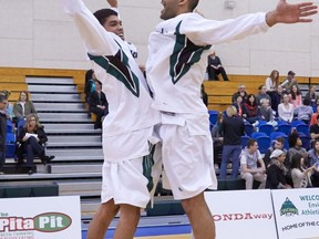 Fraser Valley Cascades' fifth-year seniors Sam Freeman (left) and Kyle Grewal greet each other before the final home game of their university basketball careers last Friday at UFV's Envision Athletic Centre. (Photo courtesy Tree Frog Imaging)