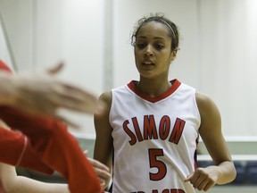 HI, 5... Simon Fraser Clan senior forward as captured by the school's staff photographer Ron Hole during a game at the West Gym atop Burnaby Mountain. (Ron Hole, SFU athletics)