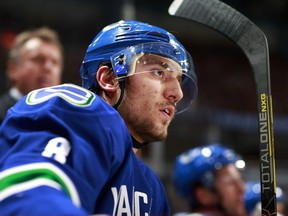 Chris Tanev will get his shot in the top four on Thursday against Dallas. (Photo Jeff Vinnick/Getty)