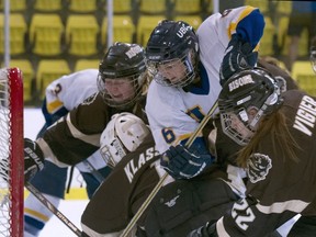 UBC's Nicole Saxvik crashes the crease during action from Saturday's decisive Game 2 win over Manitoba at Father David Bauer Arena. (Richard Lam, UBC athletics)