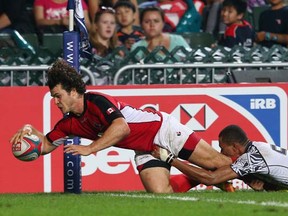Taylor Paris scores Canada's lone try in their Pool D loss to Fiji at the Hong Kong Sevens (Photo by Cameron Spencer/Getty Images)