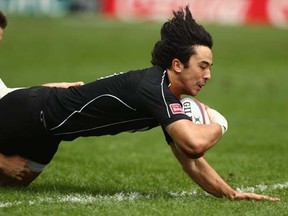 Nathan Hirayama and his mates sealed the deal against Portugal, setting up a plate final encounter with Samoa at the 2013 Hong Kong Sevens. (Photo by Mark Kolbe/Getty Images)