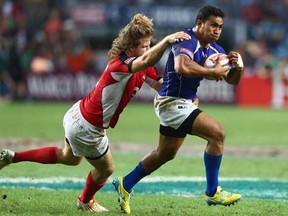 Rugby Canada's Conor Trainor and his mates did enough defensively against the likes of Samoa's Reupen Levasa in the Plate final at the Hong Kong Sevens. It was their attack that struggled. (Photo by Mark Kolbe/Getty Images)