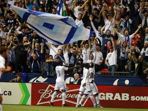 The Vancouver Whitecaps celebrate Gershon Koffie's goal. T'was a nice build up. (Getty Images)