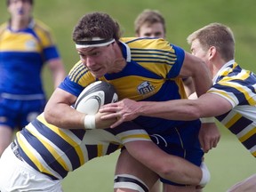 UBC Thunderbirds' Charlie Thorpe looks to split a pair of Cal defenders during second leg of annual rugby rivalry, Sunday at Thunderbird Stadium. (Richard Lam, UBC athletics)