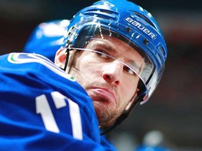 VANCOUVER, CANADA - MARCH 17:  Ryan Kesler #17 of the Vancouver Canucks looks on from the bench during their NHL game against the Columbus Blue Jackets at Rogers Arena March 17, 2012 in Vancouver, British Columbia, Canada. Vancouver won 4-3. (Photo by Jeff Vinnick/NHLI via Getty Images)
