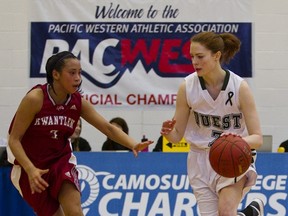 Kwantlen's Jessica Villadiego (left) keeps a close eye on Quest's Andrea Eidsvik during PACWEST opening-round provincial tournament contest Thursday at Victoria's Camosun College. (Kevin Light Photography)