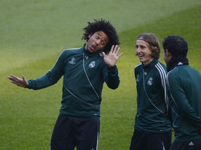 Real Madrid's Marcelo and Luka Modric practise in Manchester.