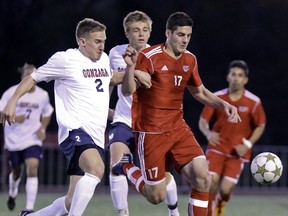 Simon Fraser's Carlo Basso (right) is pursued by Gonzaga defender Josh Phillips during friendly played Saturday atop Burnaby Mountain. (Ron Hole, SFU athletics)