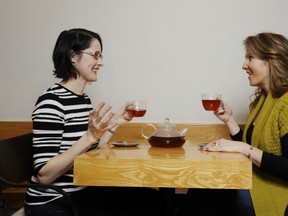 Petra Blackmore and Sheena Way share some vanilla rooibos, a herbal tea rich in antioxidants and a good PR machine. (Stuart Davis/PNG FILES)