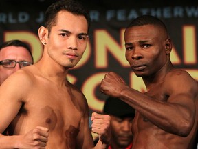Nonito Donaire (left) and Guillermo Rigondeaux pose that Friday's weigh-in. Photos: Chris Farina / Top Rank