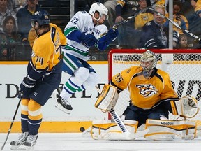 The Vancouver Canucks' Daniel Sedin attempts to score on Nashville goalie Pekka Rinne on April 15, 2013. Getty Images photo.