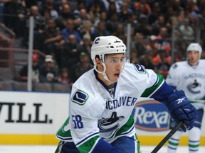 Frankie Corrado in a preseason game for the Vancouver Canucks back in September 2011. Getty Images file photo.