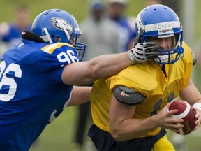 UBC quarterback Greg Bowcott led his team on a pair of scoring drives Saturday as the Thunderbirds wrapped up spring camp with its annual Blue-Gold scrimmage at T-Bird Stadium. (Gerry Kahrmann, PNG)