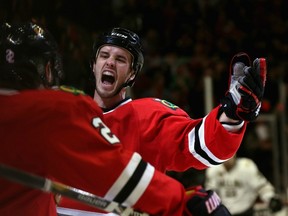 The Chicago Blackhawks' Niklas Hjalmarsson celebrates a goal on April 15, 2013 in Chicago. Getty Images photo.