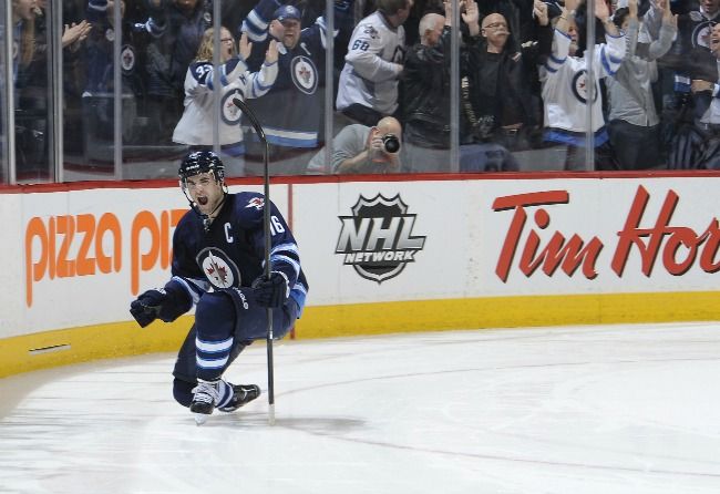 B.C. boy Andrew Ladd, the captain of the Winnipeg Jets, scored the shootout winner against the Tampa Bay Lightning on April 16, 2013 in Winnipeg. Getty Images file photo.