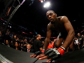 Jon Jones enters the Octagon for his light heavyweight title fight with Chael Sonnen at UFC 159 Saturday night at the Prudential Center in Newark, New Jersey.