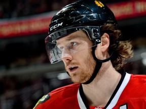 The post-game exchange between Duncan Keith and a female TEAM 1040 staffer set off a stream of tweets Monday night. (Getty Images via National Hockey League).
