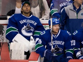 It’s ridiculous that the Vancouver Canucks’ management allows its $64-million goalie, Roberto Luongo, to sit on the bench as a backup. (THE CANADIAN PRESS FILES)