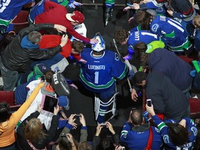 Roberto Luongo walks out onto the ice at Rogers Arena before the Canucks game against the St. Louis Blues on March 19, 2013. Getty Images photo.