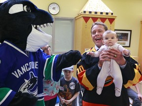 Former Vancouver Canuck Pavel Bure at BC Children's Hospital on April 4, 2013. Getty Images photo.