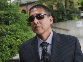 Former RCMP officer Benjamin “Monty” Robinson leaves New Westminster Supreme Court in July 2012. (Jason Payne/PNG FILES)