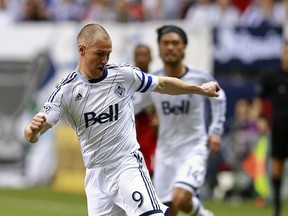 Whitecaps coach Martin Rennie says Kenny Miller isn't going anywhere this season. Rumours of a Miller move to Rangers persist. (Getty Images)