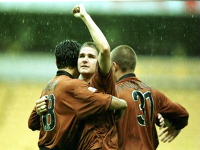 Whitecaps assistant coach Carl Robinson, a former Wolves player shown herein a 2000 game against Norwich City, is a candidate for the vacant Wolves job, according to an English report. (Getty Images)