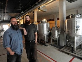 Co-owners Nigel Springthorpe, left, and Conrad Gmoser inside the forthcoming Brassneck Brewery on Main Street, Vancouver.