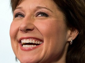 Premier Christy Clark smiles during a news conference at her office in Vancouver on Wednesday May 15, 2013, after winning a majority in the provincial election on Tuesday. (THE CANADIAN PRESS)
