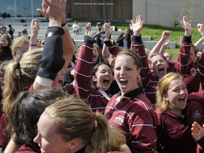 Cowichan Thunderbirds' players celebrate a double overtime victory over seven-time BC champion Carson Graham in Saturday's Triple A rugby finale at UBC. (Arlen Redekop, PNG)