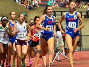 Simon Fraser's Helen Crofts (right) pictured with teammate Lindsey Butterworth at the recent GNAC championships. The Clan dominated the women's 800 at NCAA nationals on Saturday. (GNAC photo)