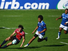 WREXHAM, UNITED KINGDOM - JUNE 10: Nate Ebner of the USA gathers the loose ball during the IRB Junior World Cup match between Samoa and USA at the Racecourse Ground on June 10, 2008 in Wrexham, Wales. (Photo by Warren Little/Getty Images)