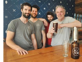 The family Mills of Four Winds Brewing Co.: From left, Brent, Adam, Sean and dad Greg.