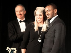 Brookswood's Danielle Lawrie, pictured here in 2008 with Seahawks' Bobby Engram at the Seattle PI Athlete of the Year banquet.