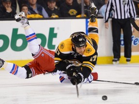 Bruins power forward Milan Lucic is the conversation for the Conn Smythe Trophy at the half-way point of the NHL playoffs. (Getty Images)