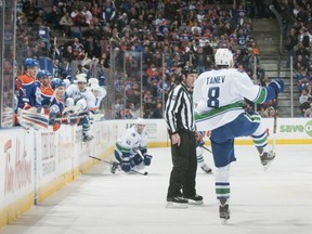 The Canucks' Chris Tanev scores his first NHL goal against Edmonton in February 2013. Getty Images file photo.