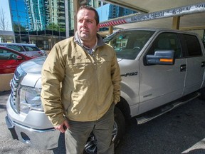Rodrigo Freig is one of many motorists who have been charged varying amounts when crossing the Port Mann toll bridge. (Ric Ernst/PNG FILES)