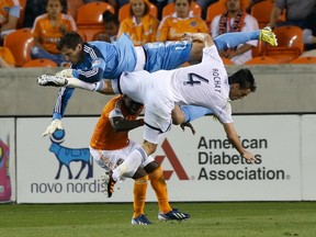 Alain Rochat of the Vancouver Whitecaps in action against the Houston Dynamo in March 2013. Getty Images file photo.