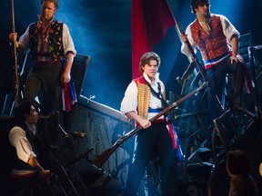 Jason Forbach as Enjolras  beautifully sings the student rebels of Les Mis to their doom.  Photo by Kyle Froman
